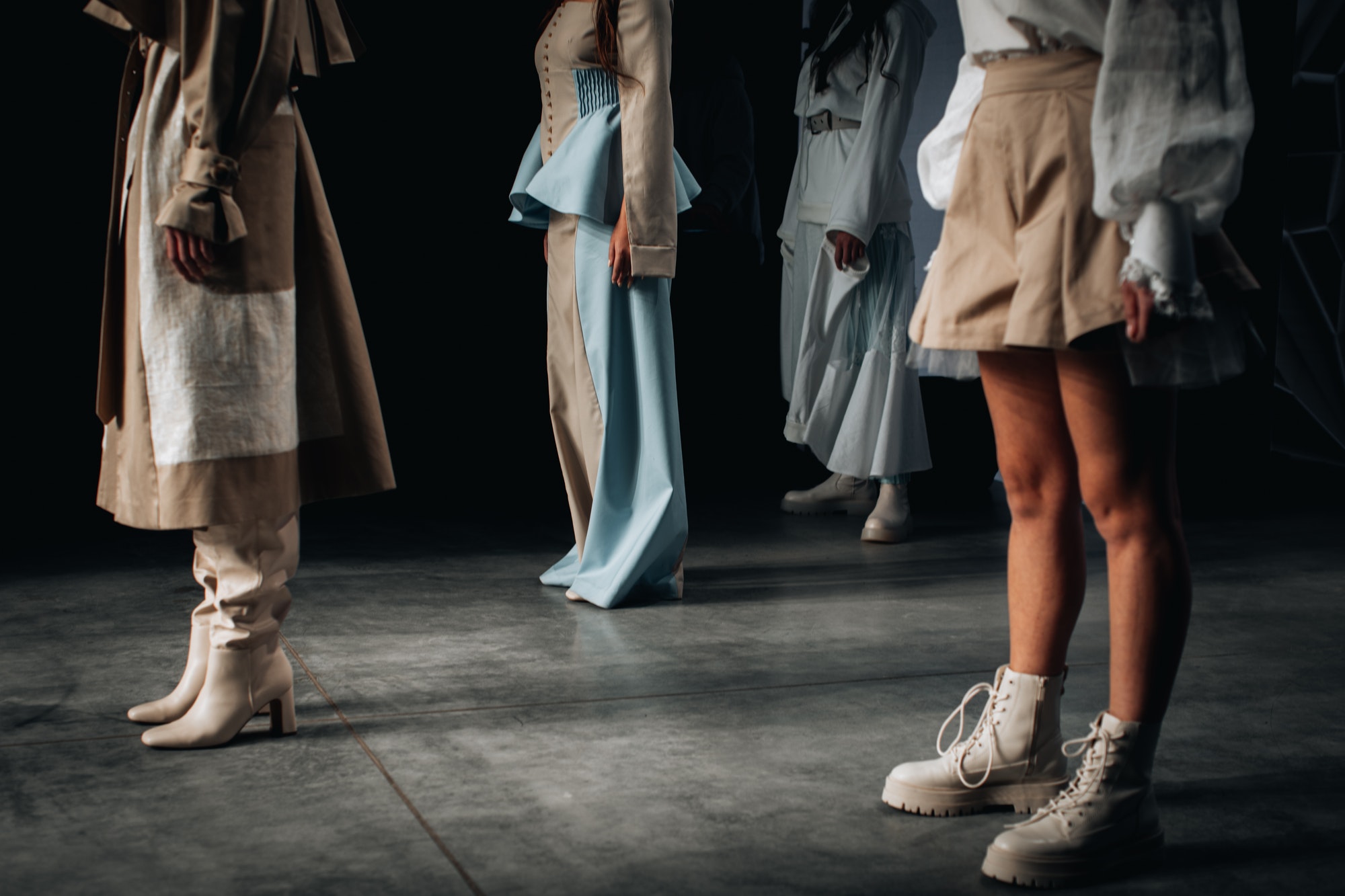 models-in-designer-stylish-outfits-on-the-runway-of-a-fashion-show-1