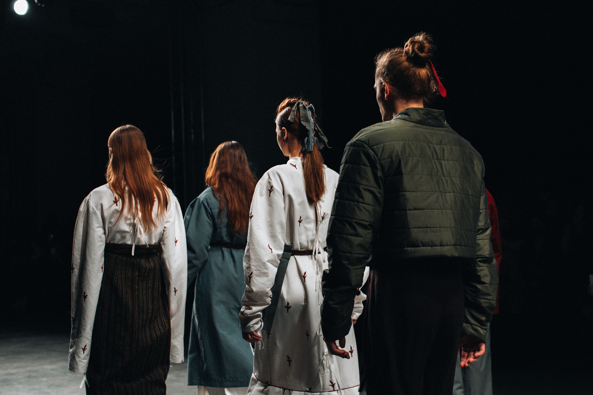 models-in-designer-stylish-outfits-on-the-runway-of-a-fashion-show